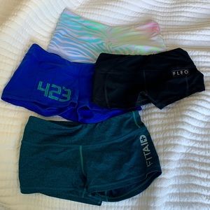 Lot of 4 workout spandex shorts sizes small and medium fleo reebok fitaid